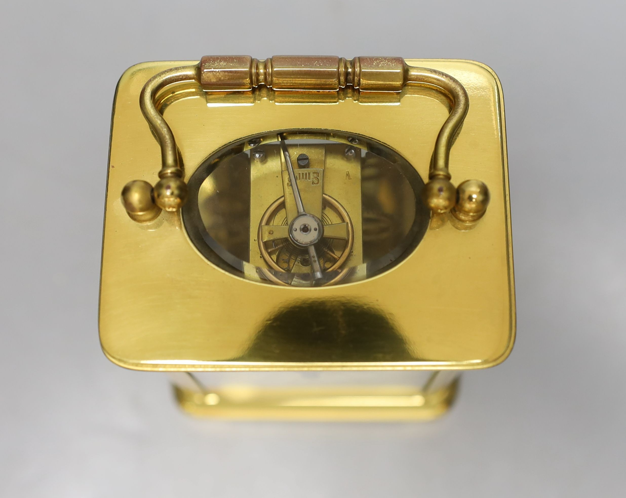 A cased late 19th century French gilt brass carriage timepiece with pastoral scene enamelled dial - 13cm talk